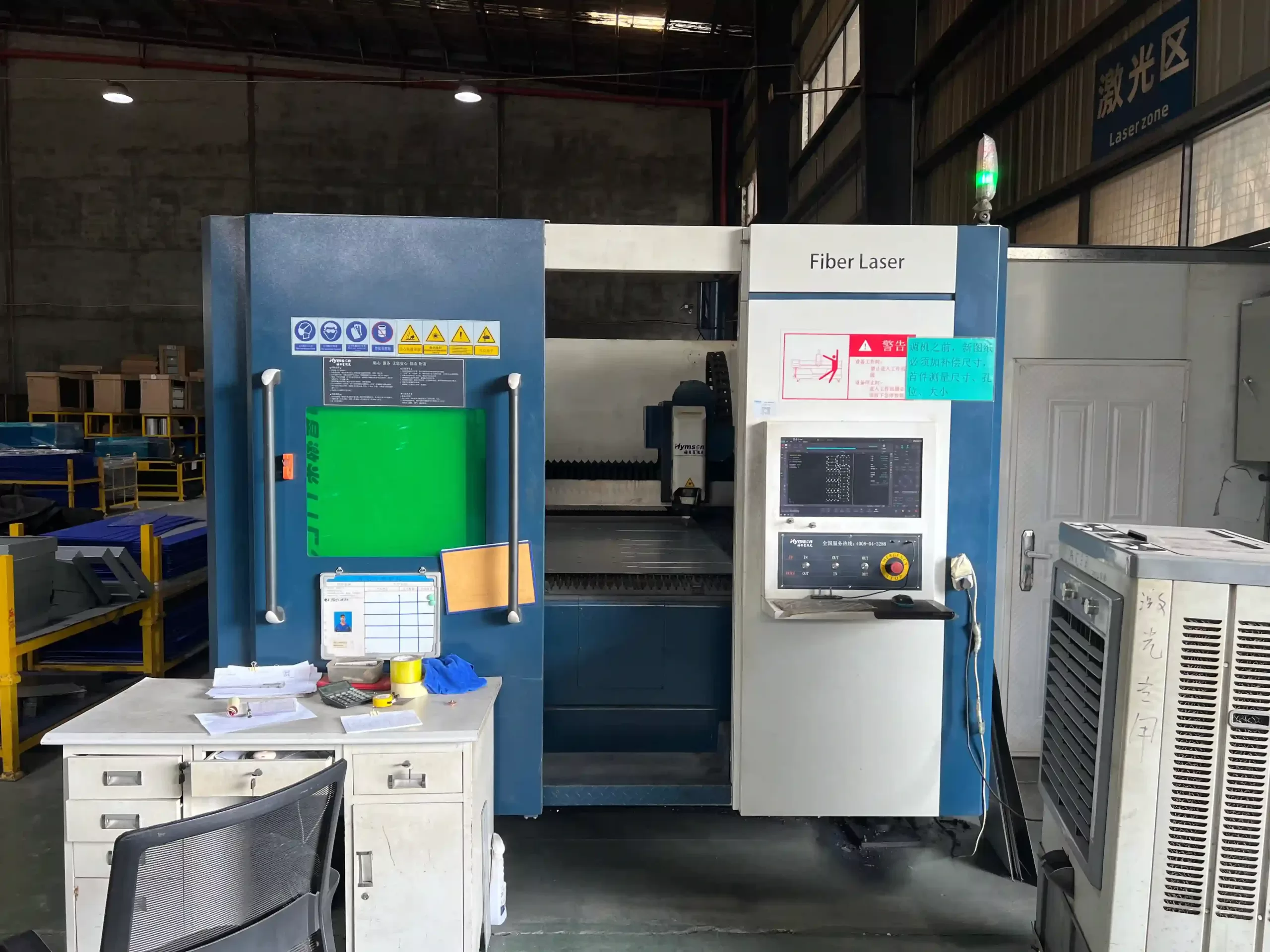 Laser cutting machine in operation