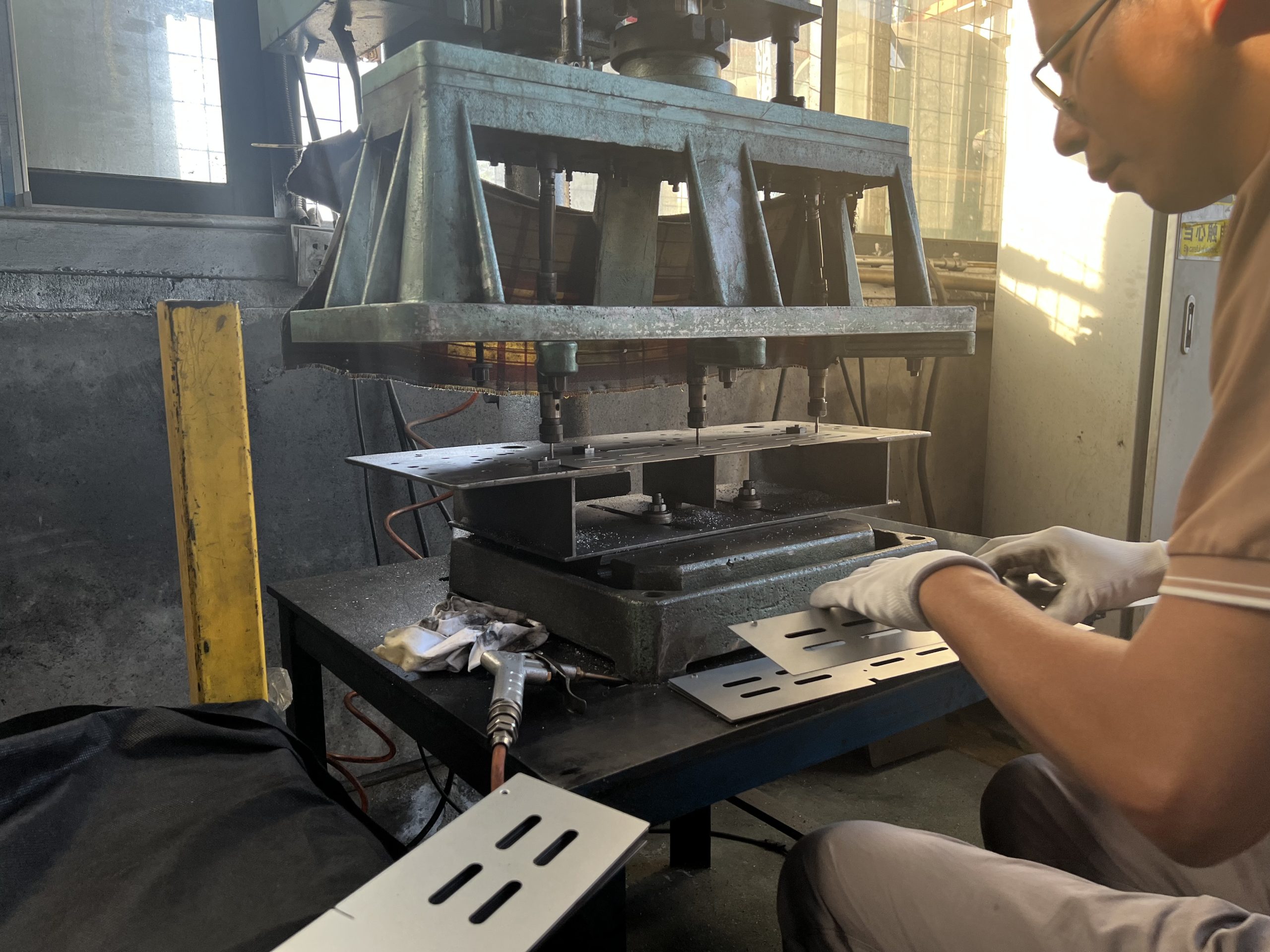 Stamping and tapping work