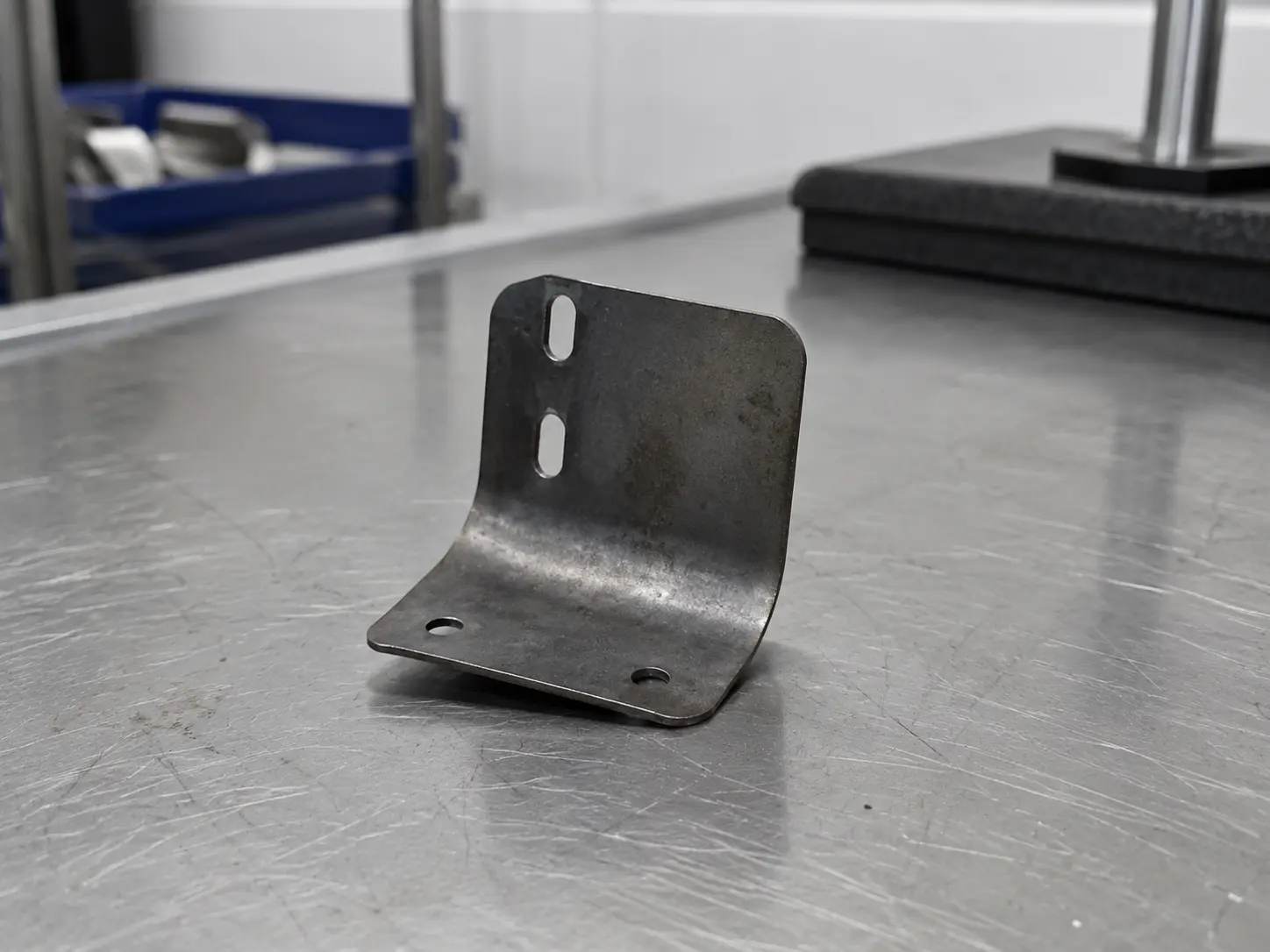 Unfinished metal part with dull and inconsistent appearance